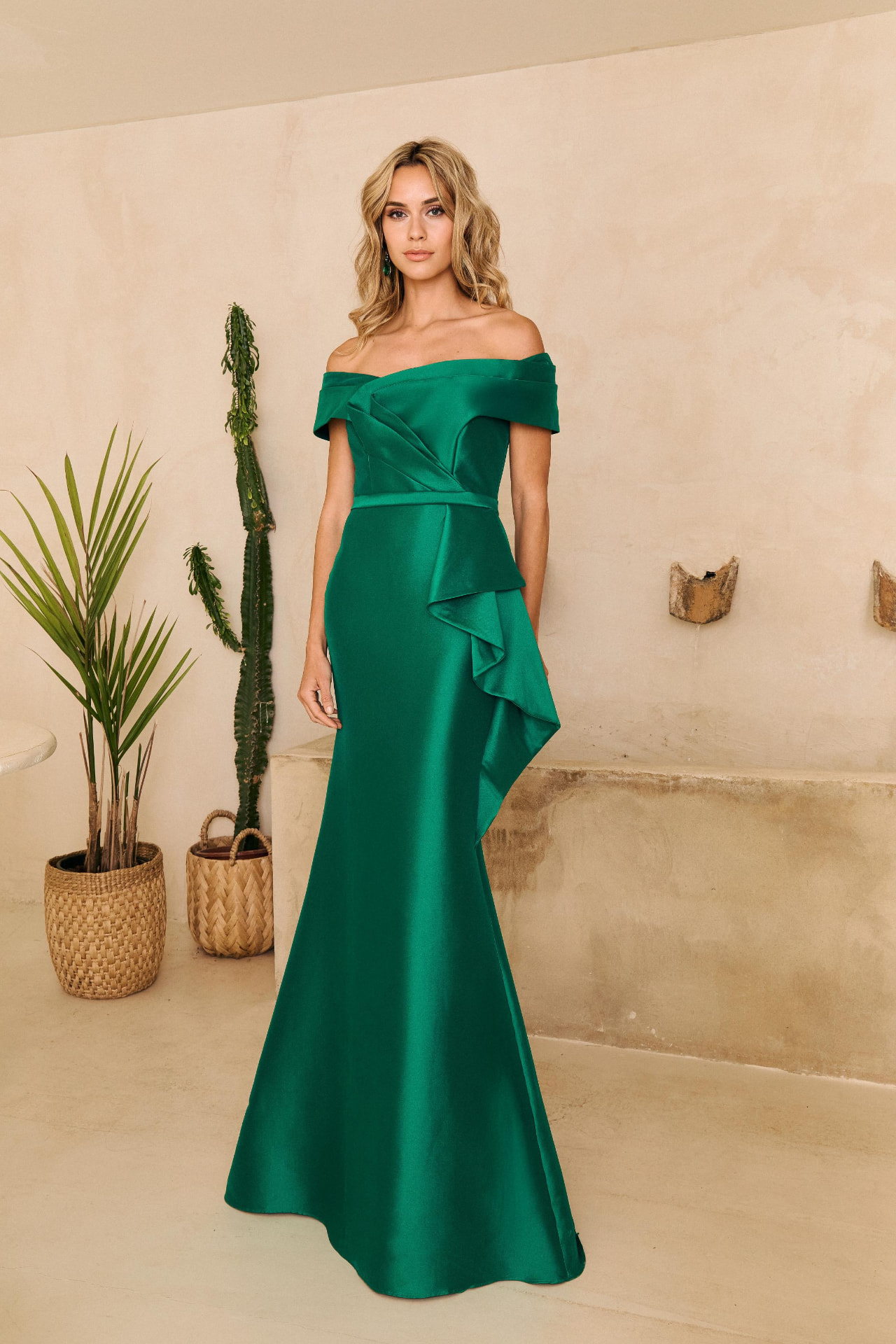 Emerald green off-shoulder satin mermaid gown with cascading ruffle