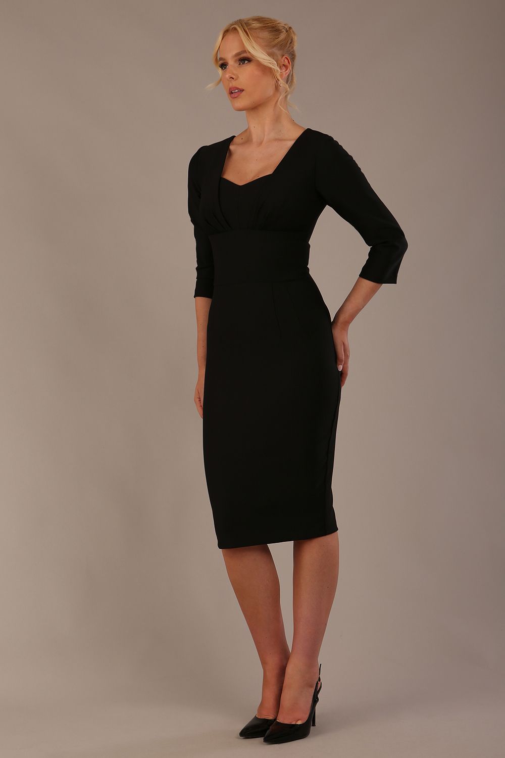 Black graduation dress with a pleated sweetheart neckline and fitted waistband