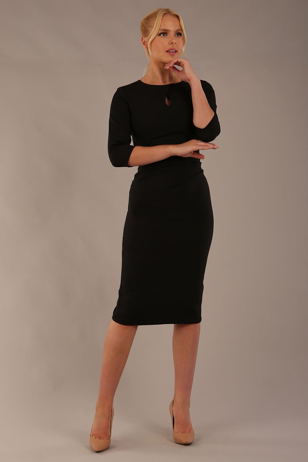 Black knee-length graduation dress shown from a front angle with a keyhole neckline