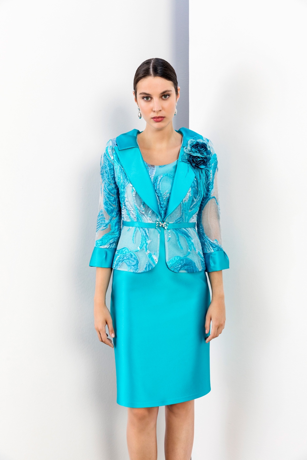 Turquoise lapel jacket with metallic embroidery over matching sheath dress