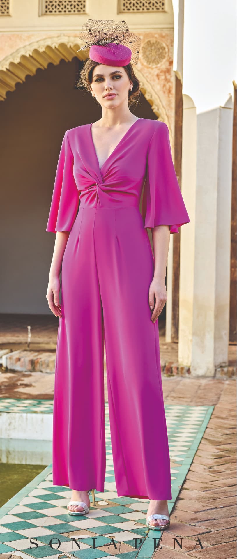 Fuchsia twist-front wide-leg jumpsuit with flared three-quarter sleeves